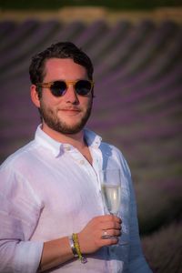 Portrait of young man wearing sunglasses