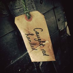 Close-up of text on wall