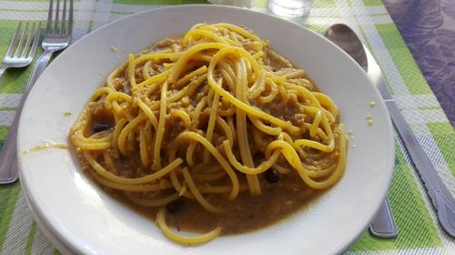 Close-up of served food in plate