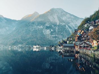 Panoramic view of lake and buildings against sky