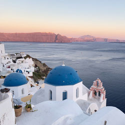 Panoramic view of buildings against sky during sunset