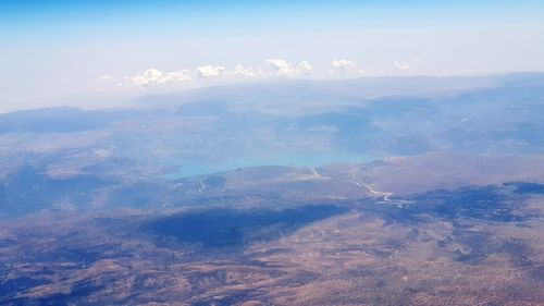 Aerial view of mountains against sky