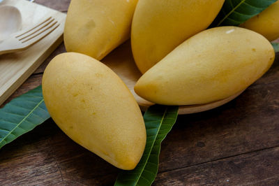 High angle view of mangoes on table