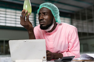 Young man using mobile phone