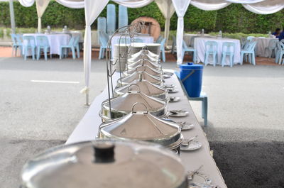 Close-up of empty chairs and table in playground