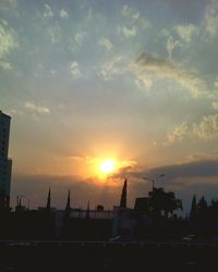 Sun shining through clouds