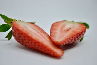 Close-up of chopped fruit against white background