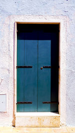 Old door house in burano architecture, venice, italy