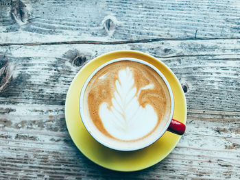 Directly above shot of cappuccino on table