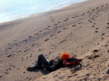 High angle view of sand at sandy beach