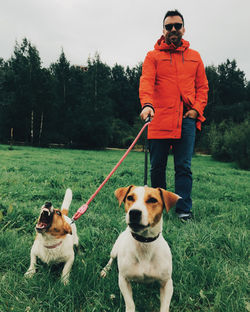 Dog standing on field