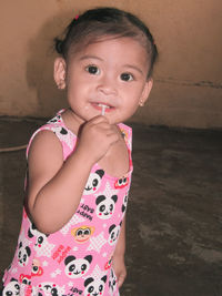 Portrait of smiling girl standing