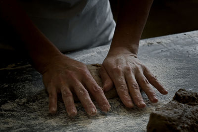 Close-up of man working on wood