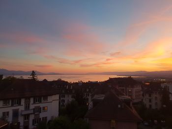 High angle view of townscape against sky during sunset