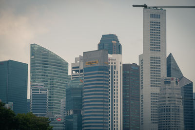 Low angle view of buildings against sky in city