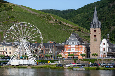 Bernkastel kues riverside with tower and ferris wheel