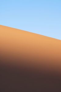 Scenic view of desert against clear sky