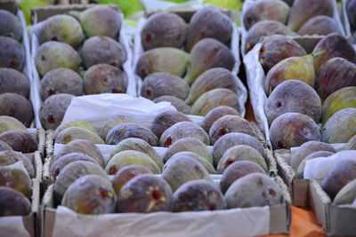 Close-up of figs for sale at market stall