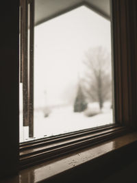 Close-up of car window during winter