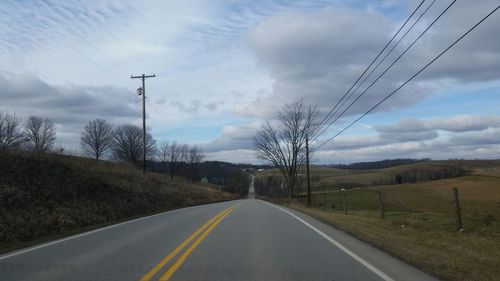 Road passing through field