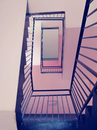 Low angle view of spiral staircase in building