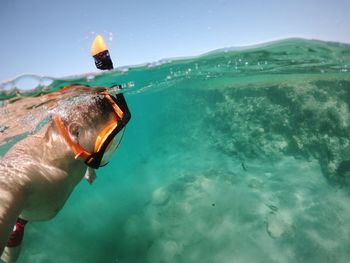 Man swimming in sea