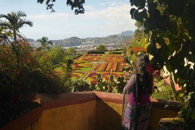 Panoramic view of agricultural field against sky