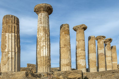 Low angle view of old ruins against sky