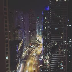 High angle view of illuminated buildings at night