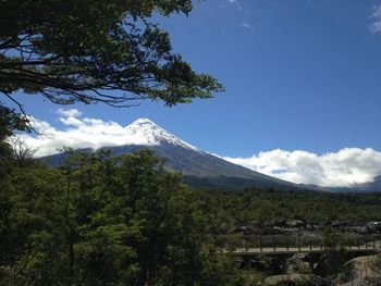 Scenic view of landscape against cloudy sky