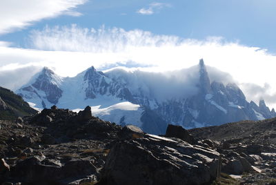 Scenic view of snowcapped mountains against sky