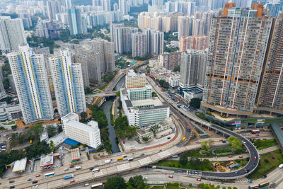 High angle view of street amidst buildings in city