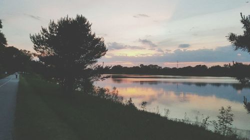 Scenic view of lake at sunset