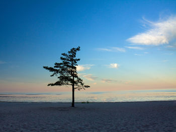 Scenic view of sea against sky at sunset