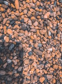 High angle view of stones on pebbles