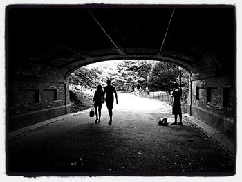 Full length of woman in tunnel