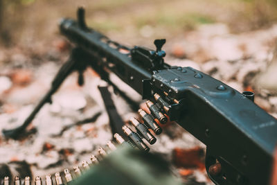 Close-up of rifle outdoors