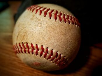 Close up of baseball ball on table