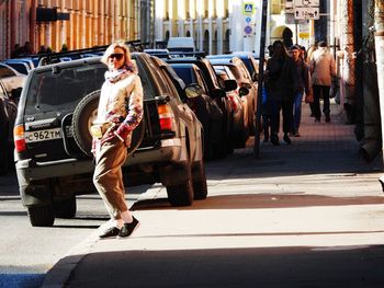 Full length of man walking on city street