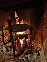 View of burning candles on wooden table