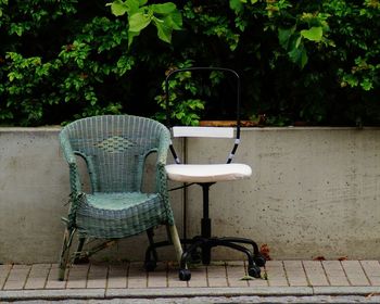 Empty chairs in yard