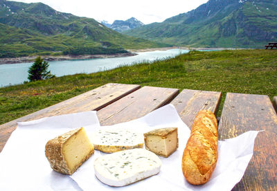 High angle view of food on lake against mountains