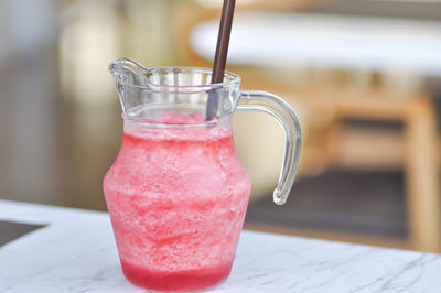 Close-up of drink in jar on table