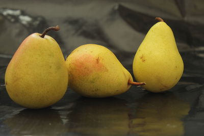 Close-up of apples on table