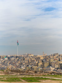 Low angle view of buildings against sky in city