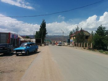 Road against cloudy sky