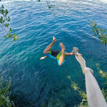 Man bungee jumping