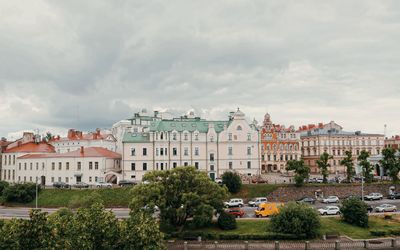 Buildings in city against sky