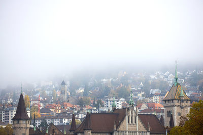 Cityscape against clear sky
