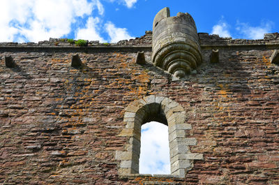 Low angle view of historical building against sky